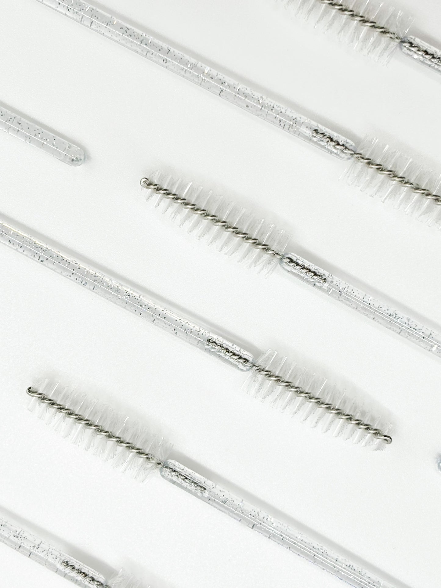 Disposable mascara wands for eyelash extension services