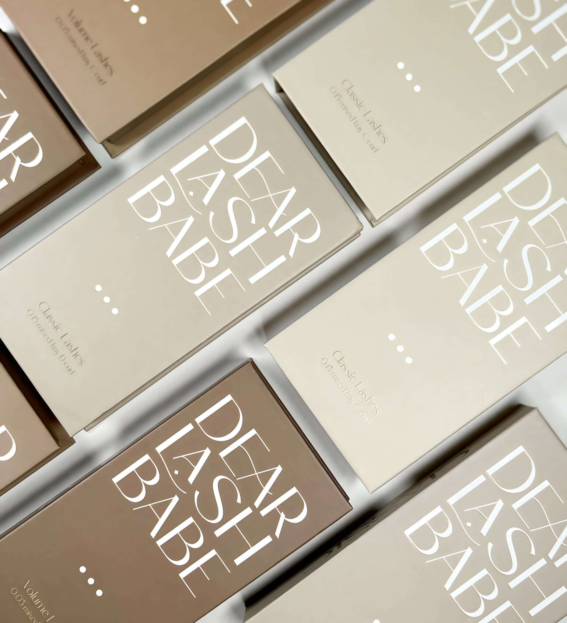 Eyelash Extension Professional Kit with tweezers, adhesive, and Signature 0.15 Mixed Trays for lash training