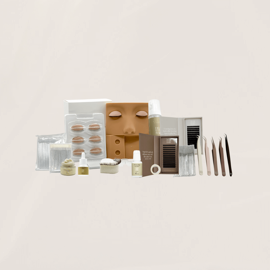 Professional eyelash extension starter training kit with a mannequin head and luxury supplies included with the Dear Lash Babe online course.