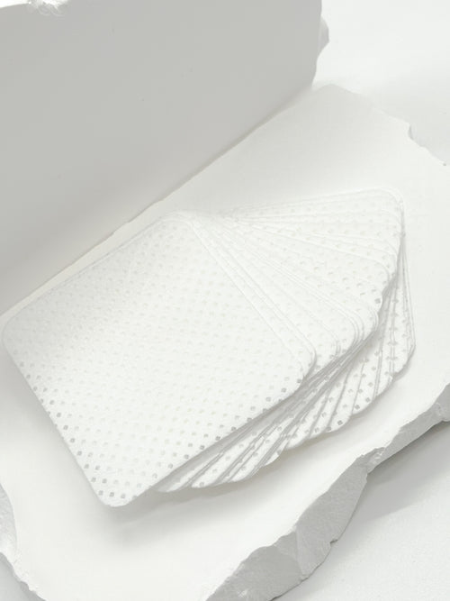 Adhesive wipes for cleaning lash glue nozzles
