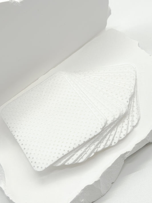 Adhesive wipes for cleaning lash glue nozzles