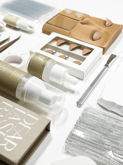 Eyelash Extension Professional Kit featuring tools and products for lash application and enhancement.