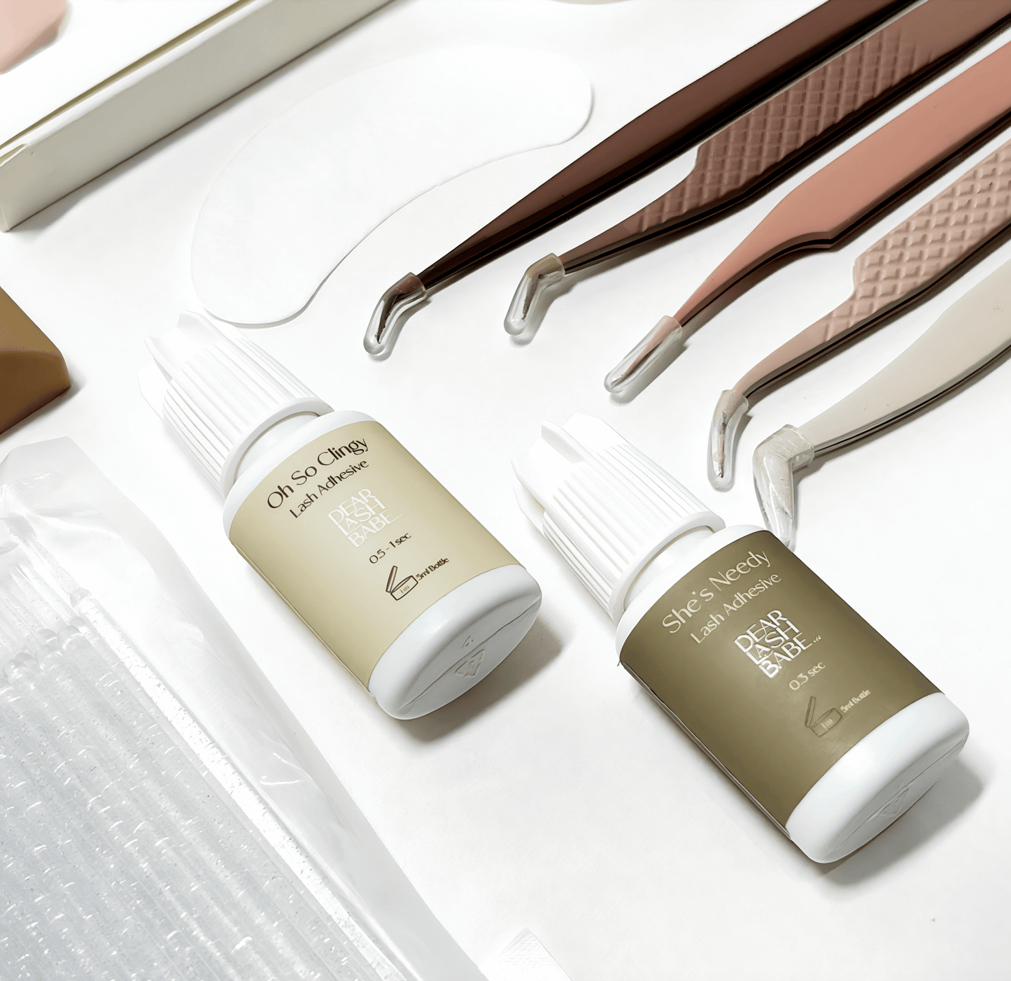 Eyelash Extension Professional Kit with lash adhesives and tools for lash application.