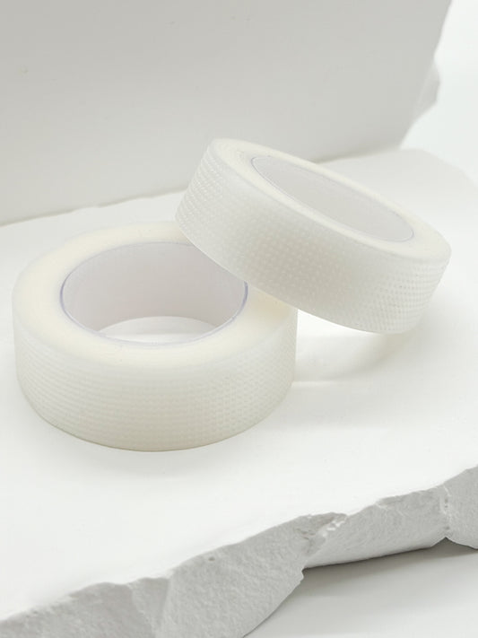Disposable lash tape roll for eyelash extension services